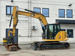 CAT 310 Rototilt + 2-kauhaa