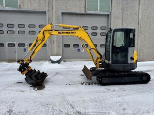 NEW HOLLAND E50SR.2 Vähän ajettu, Engcon pyörittäjä