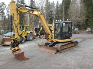 CAT 308 D CR pyörittäjällä, Средние экскаваторы